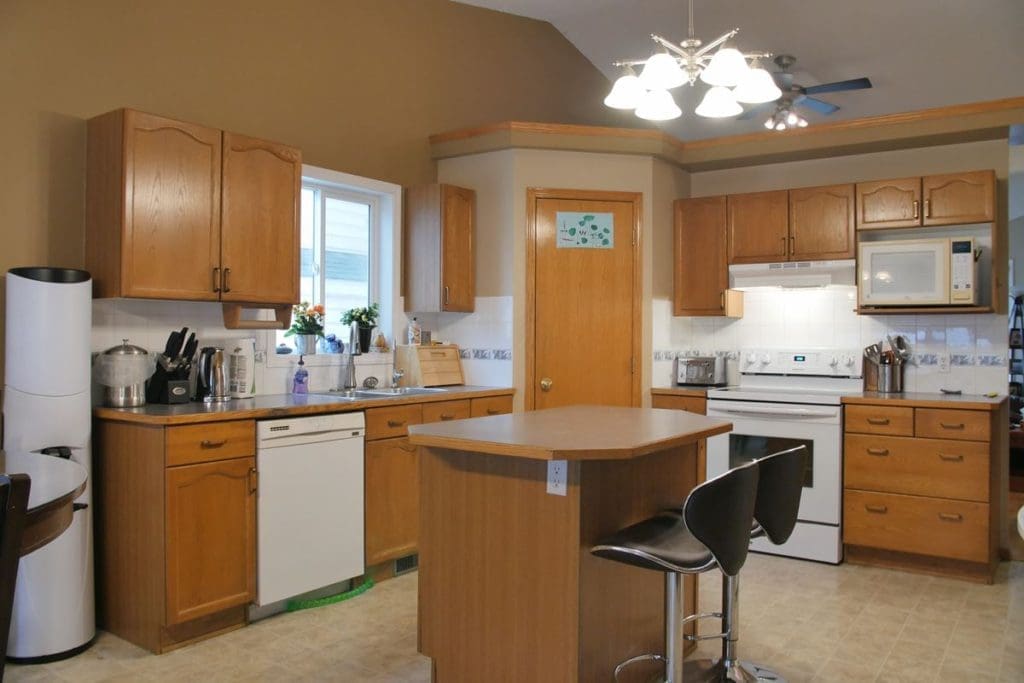 South Calgary yellow oak kitchen before painting