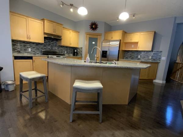 SE Calgary yellow maple kitchen before painting