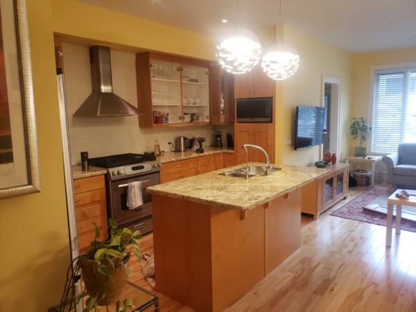 SW Calgary orange maple cabinetry before painting