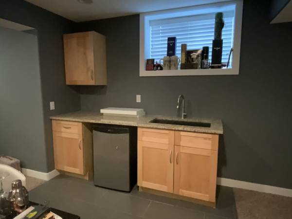 Maple basement wet bar before painting