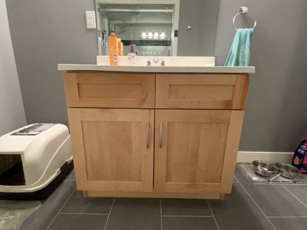 Small maple bath vanity before painting