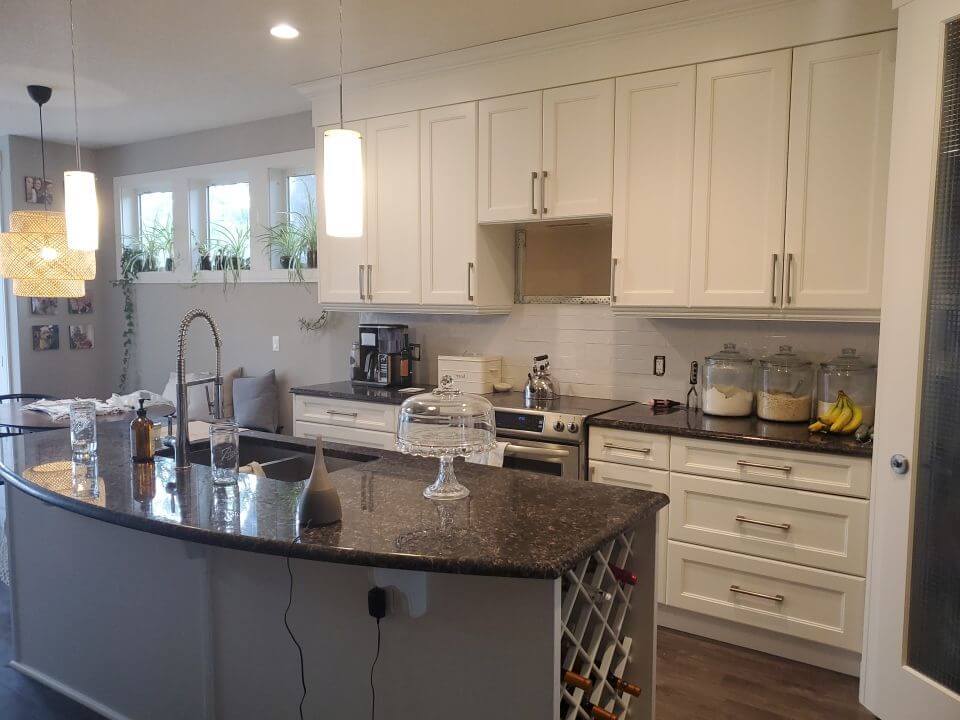 Chic white painted kitchen in NW Calgary