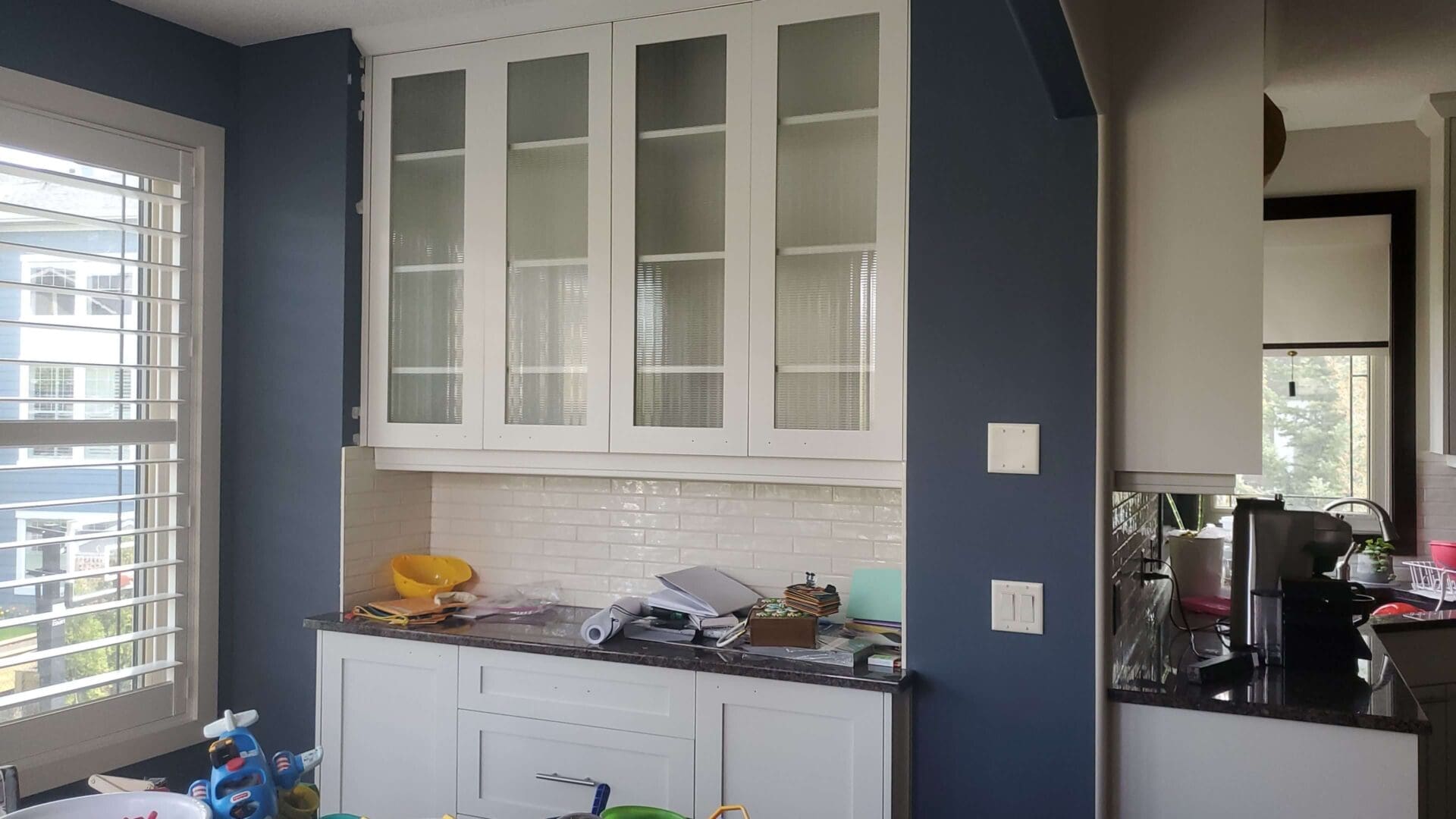 Glass Doors in a newly painted kitchen in Chapala Pointe