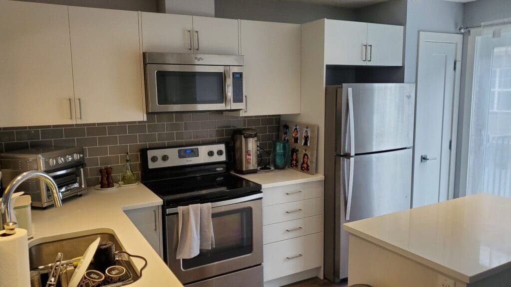 Burgundy Cabinets Painted Off-White after 4