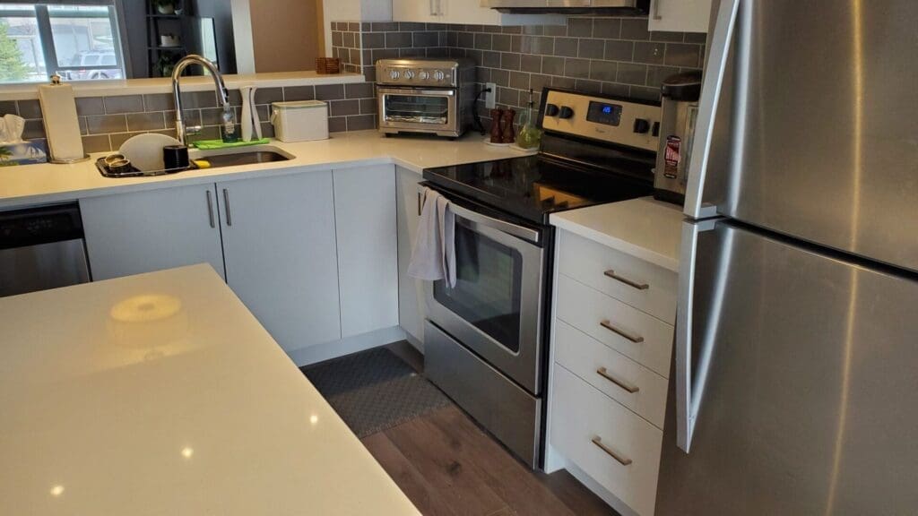 Burgundy Cabinets Painted Off-White after 3