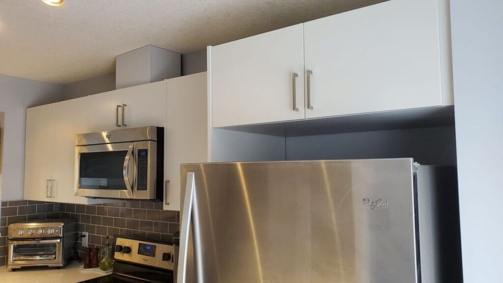 Burgundy Cabinets Painted Off-White after 2