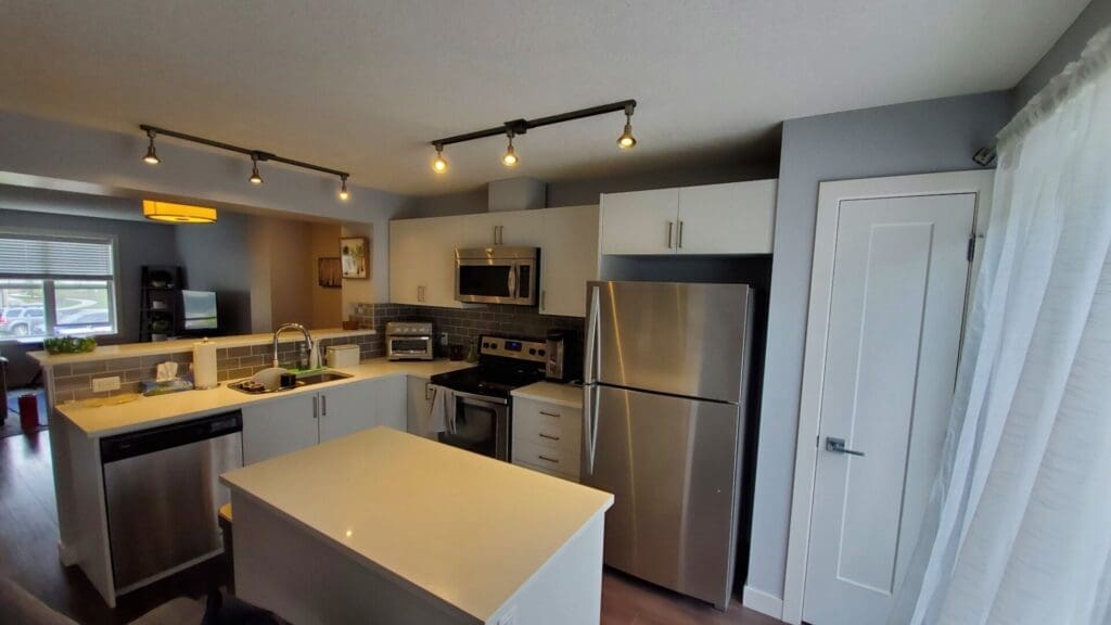 Burgundy Cabinets Painted Off-White after 1