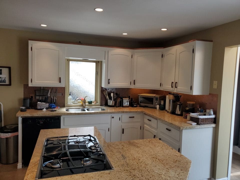 Green to White Cabinet Repaint after 8