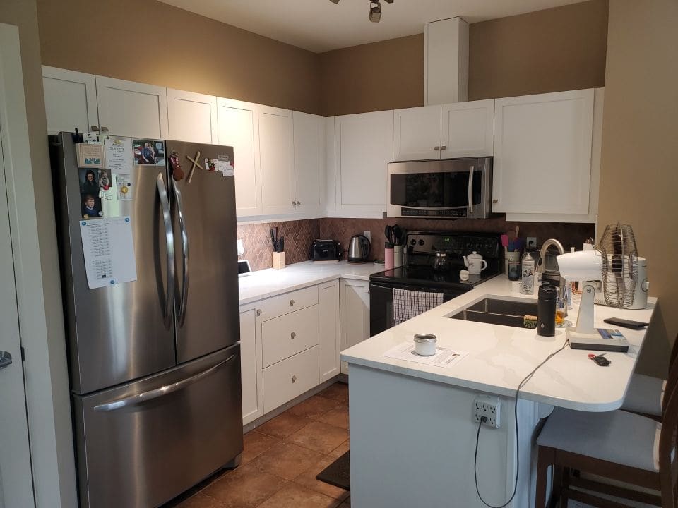 Apartment Cabinets Repainted After Photo 1