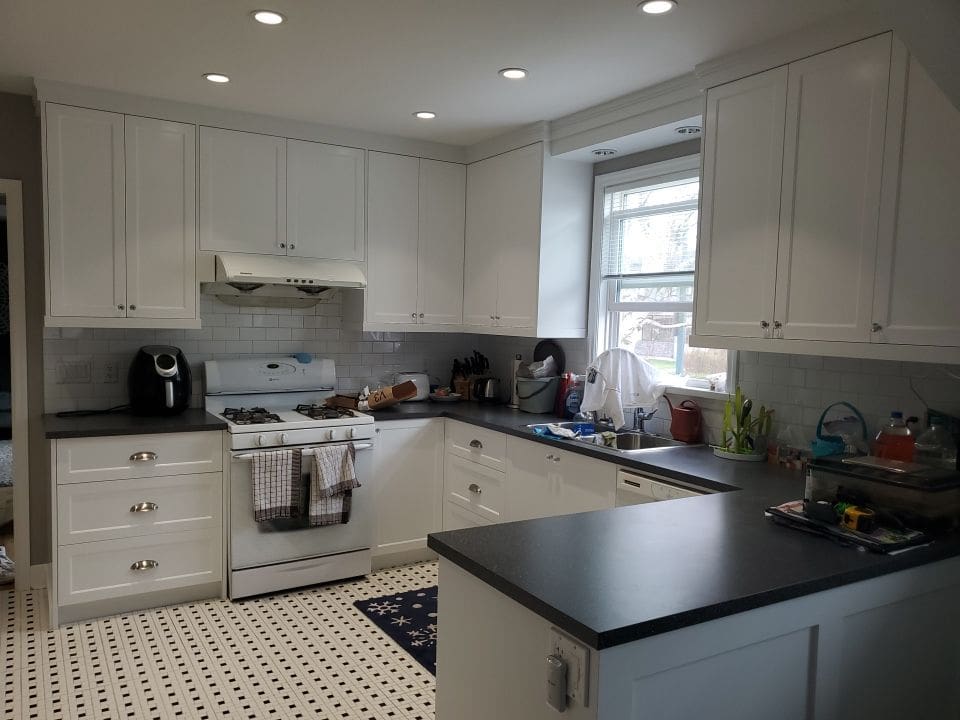 Dated White Cabinets Fixed and Repainted after 2