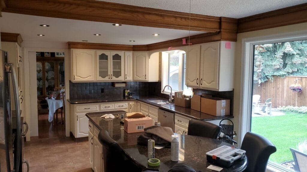 Oak Cabinetry Painted White after 10