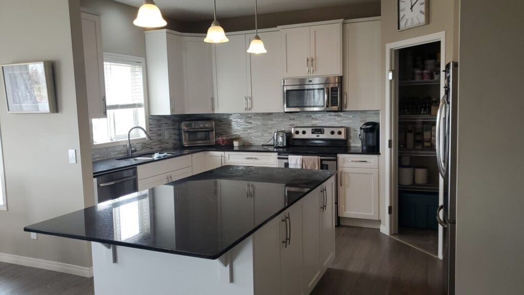 chocolate cabinets painted white after 3