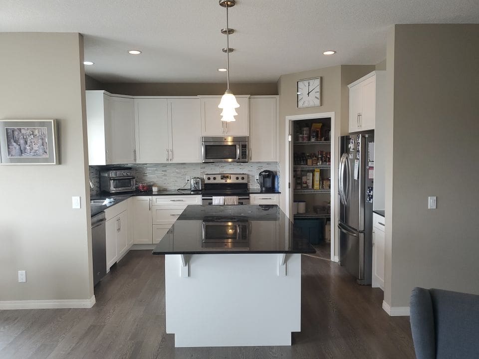 chocolate cabinets painted white after 6